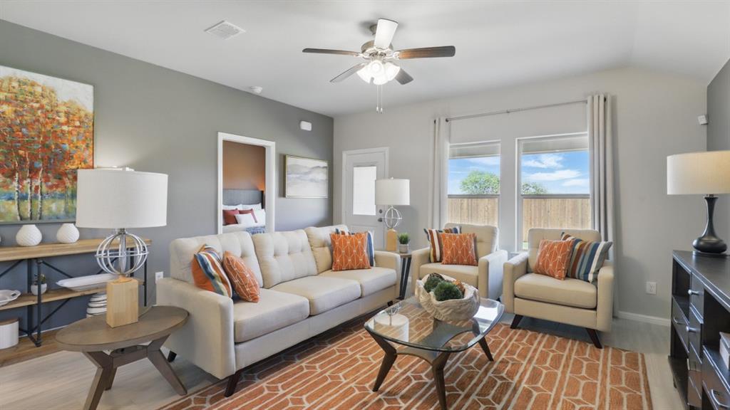 336 Pecos Drive Azle, TX 76020 - Photo 10 of 37 a living room with furniture and a large window