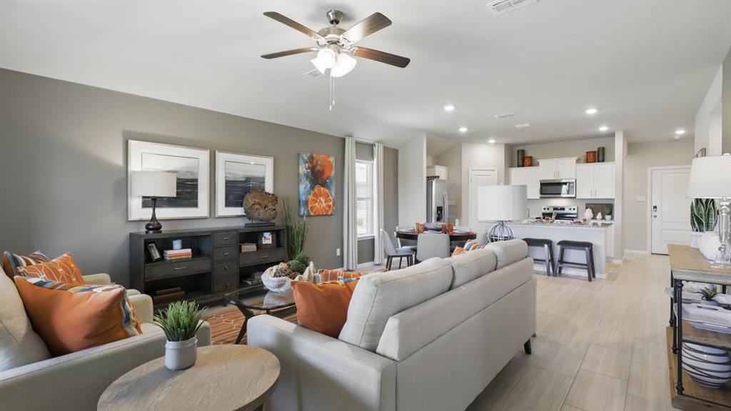 336 Pecos Drive Azle, TX 76020 - Photo 13 of 37 a living room with furniture kitchen view and a chandelier