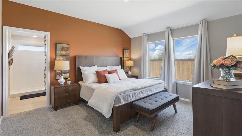336 Pecos Drive Azle, TX 76020 - Photo 14 of 37 a bedroom with a bed and a table in it