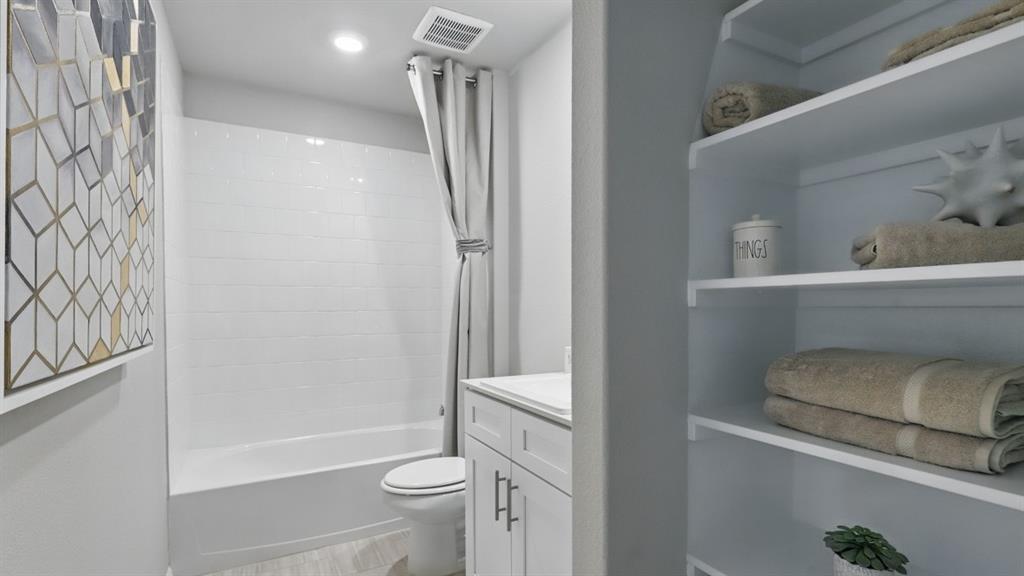 336 Pecos Drive Azle, TX 76020 - Photo 26 of 37 a bathroom with a shower and a toilet
