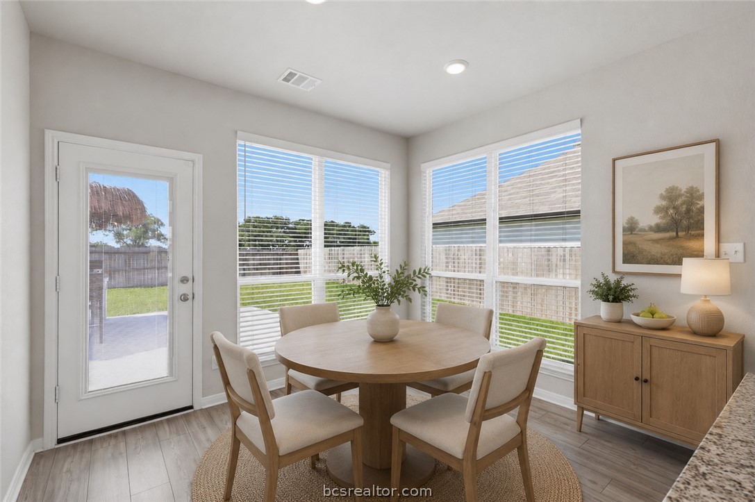 1922 Viva Road Bryan, TX 77807 - Photo 16 of 45 Bright breakfast area open to the kitchen and living room with easy access to the backyard (virtually staged).