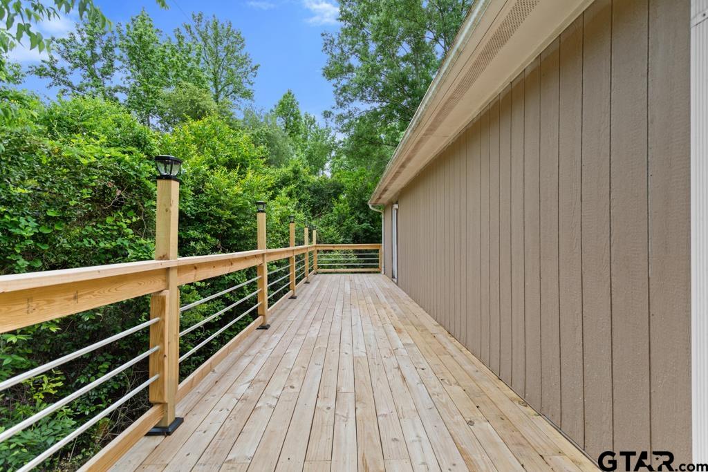 448 North Hill Road Tyler, TX 75706 - Photo 23 of 30 a view of balcony with wooden floor and fence