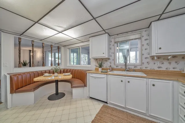 a picture of a bathroom with a shower