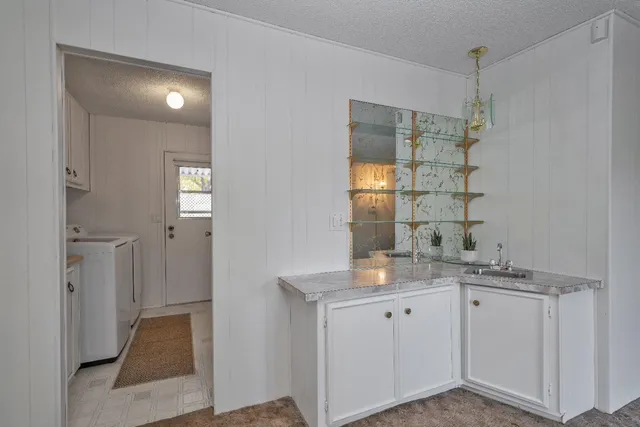 a view of a livingroom with a potted plant