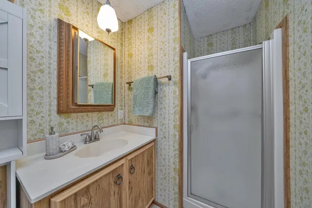 a bathroom with a bathtub and a sink