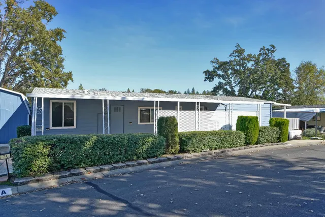 front view of a house with a street