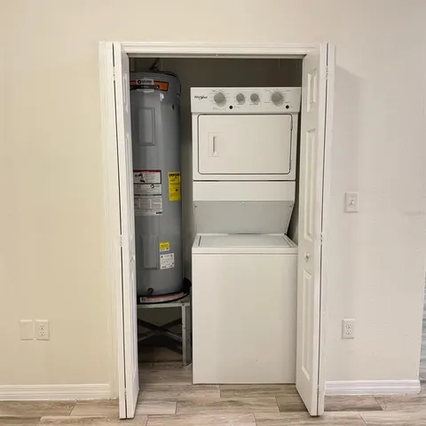 a utility room with dryer and washer
