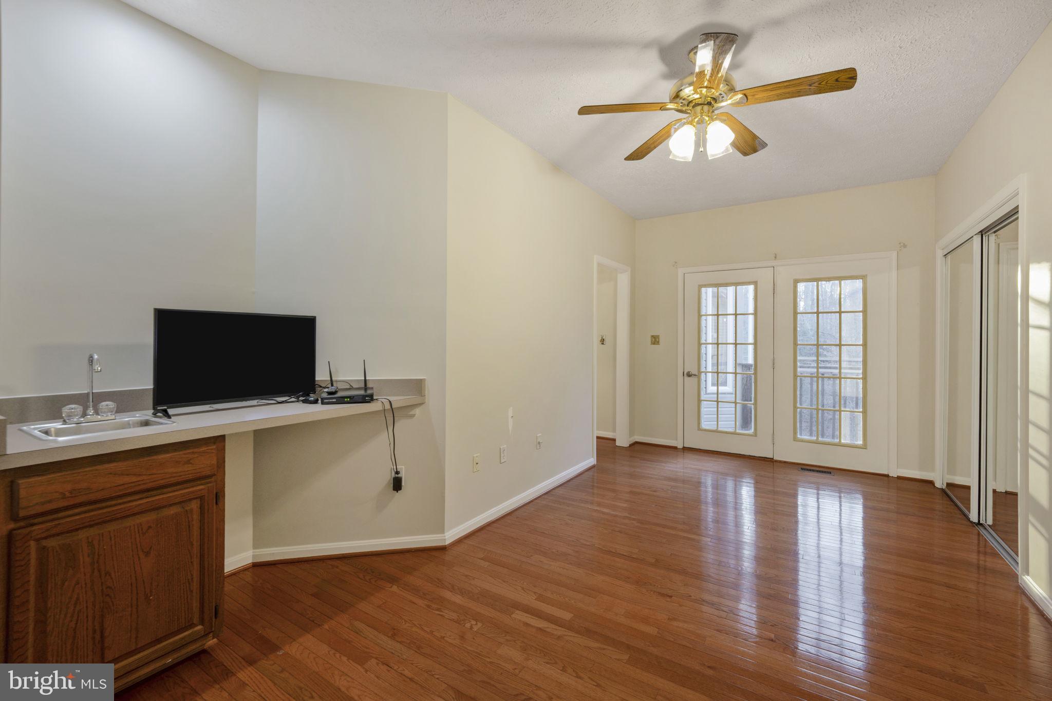 4210 Harvey Road Huntingtown, MD 20639 - Photo 25 of 89 Wet bar and closet in primary sitting room