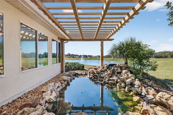 a view of a room with window and wooden floor