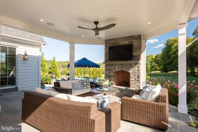 a view of entryway with wooden floor and stairs