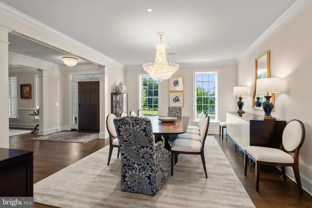 a view of a backyard with plants and patio