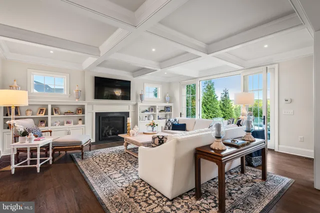 a living room with furniture fireplace and garden