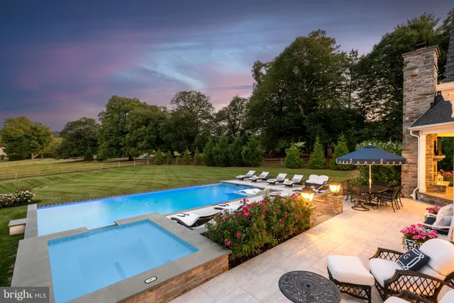 a kitchen with a stove a sink and a refrigerator