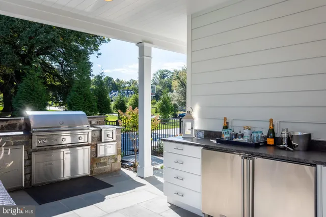 a bathroom with a tub a sink shower and mirror