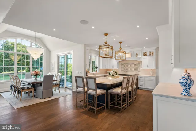 a bedroom with a bed and glass window