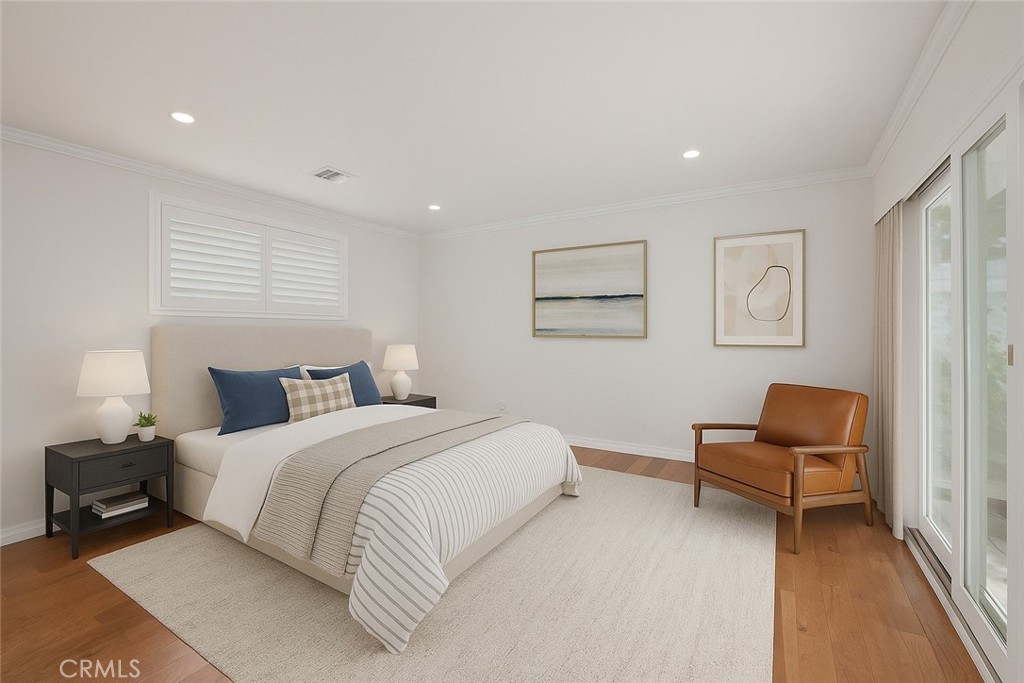 4722 Forman Lane Toluca Lake, CA 91602 - Photo 27 of 52 a bedroom with a bed and a couch