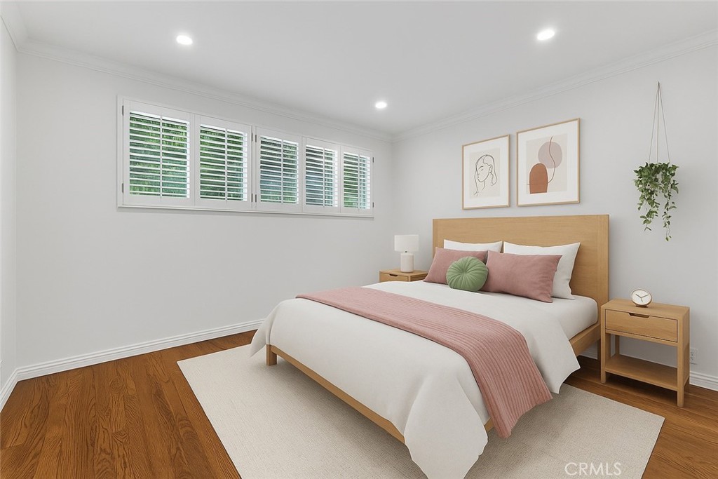 4722 Forman Lane Toluca Lake, CA 91602 - Photo 35 of 52 a bedroom with a bed and a window