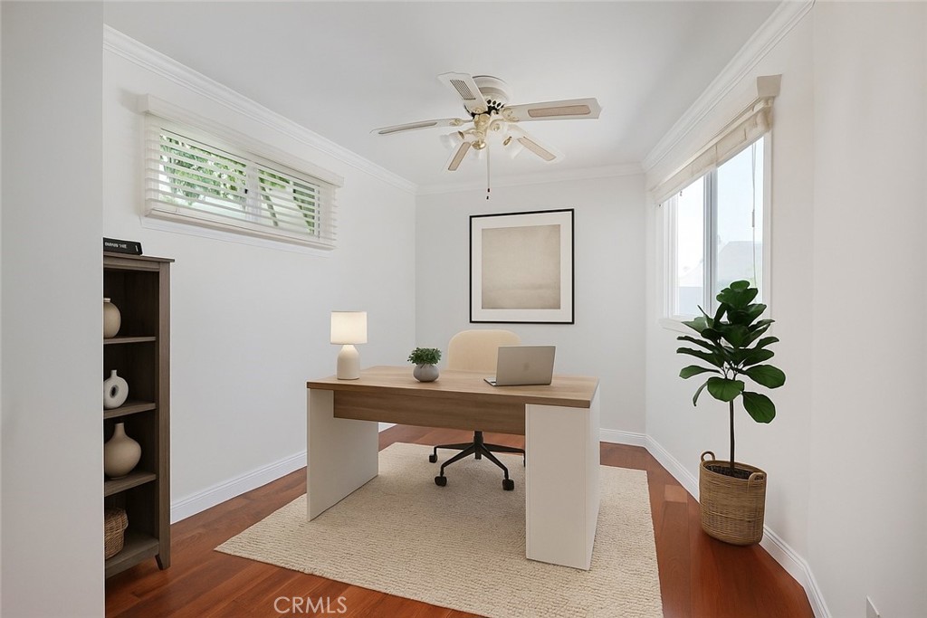 4722 Forman Lane Toluca Lake, CA 91602 - Photo 37 of 52 a workspace with furniture window and wooden floor