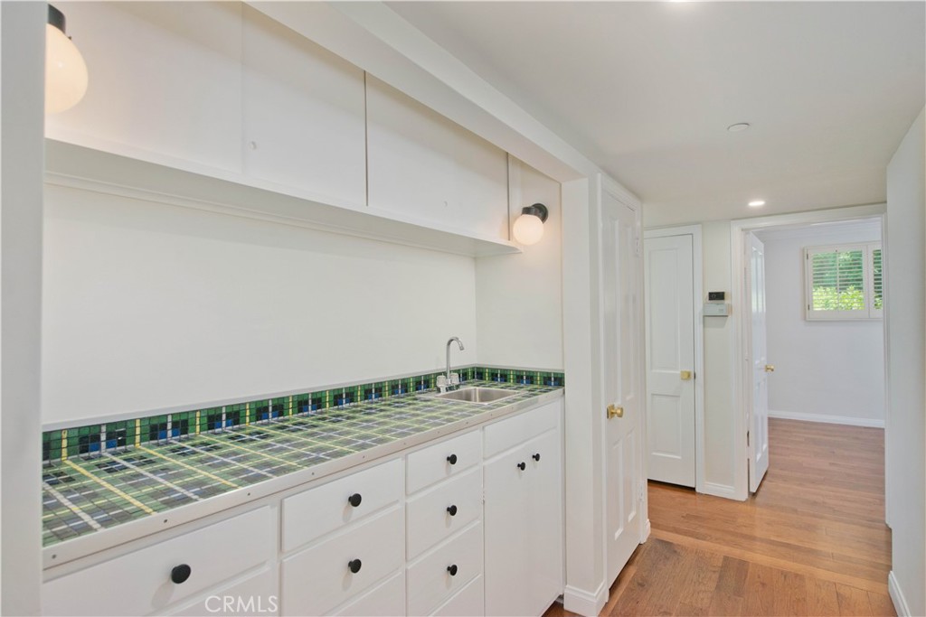 4722 Forman Lane Toluca Lake, CA 91602 - Photo 43 of 52 a view of kitchen with white cabinets