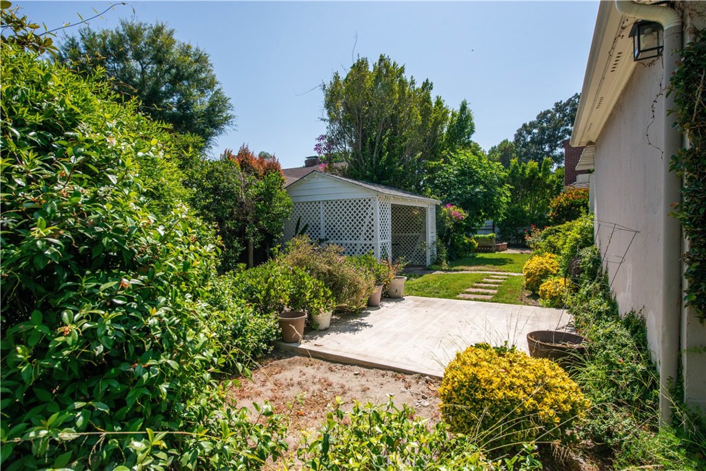 4722 Forman Lane Toluca Lake, CA 91602 - Photo 48 of 52 a view of a house with a yard and garden