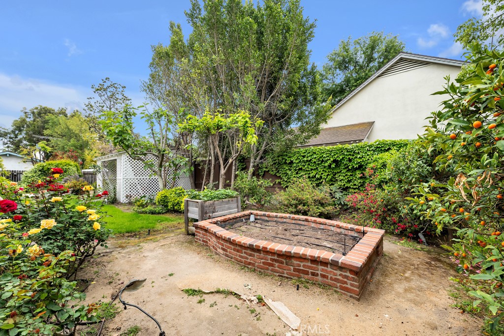 4722 Forman Lane Toluca Lake, CA 91602 - Photo 50 of 52 a view of a backyard with plants and outdoor seating