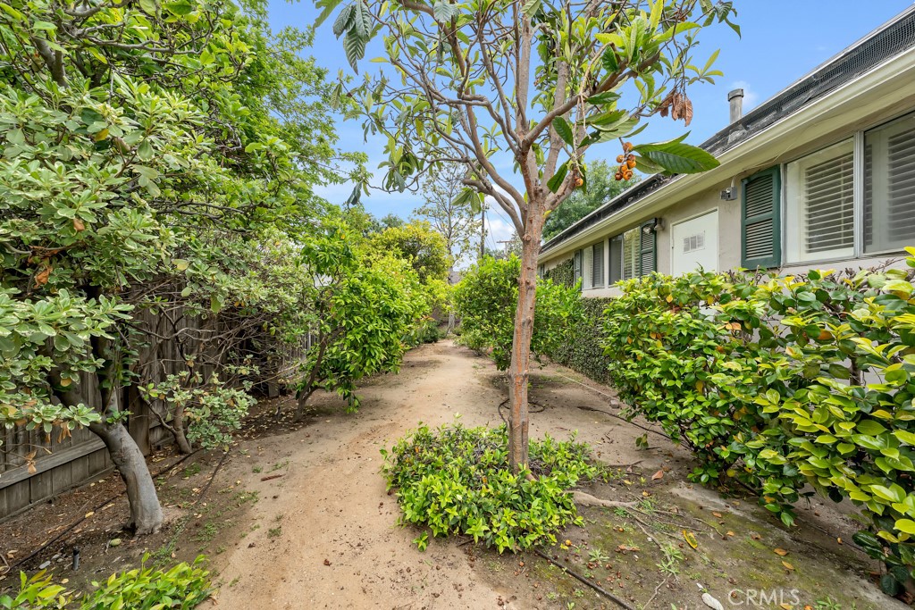 4722 Forman Lane Toluca Lake, CA 91602 - Photo 52 of 52 a pathway of a house with a yard
