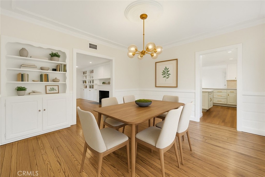 4722 Forman Lane Toluca Lake, CA 91602 - Photo 6 of 52 a view of a dining room with furniture and wooden floor