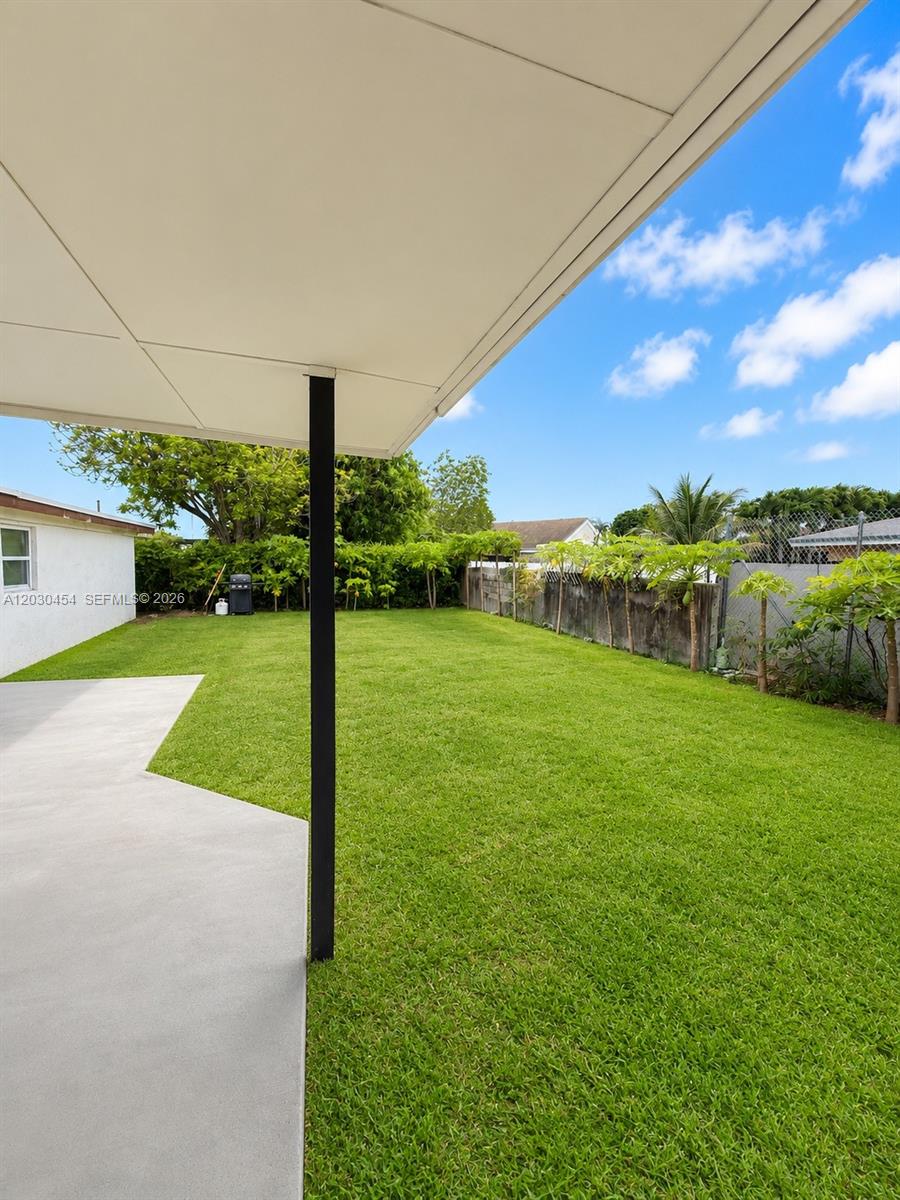 20600 Southwest 118th Place Miami, FL 33177 - Photo 2 of 10 Backyard with fruit trees