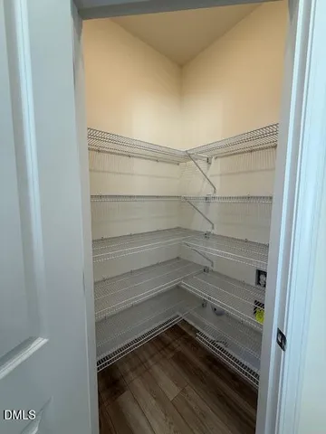 a empty closet with white paint