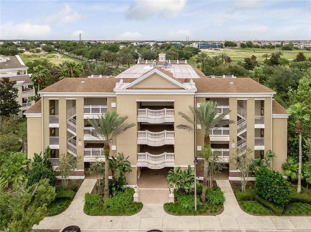 1106 Sunset View Circle, Unit 201 Reunion, FL 34747 - Photo 23 of 31 an aerial view of multiple houses