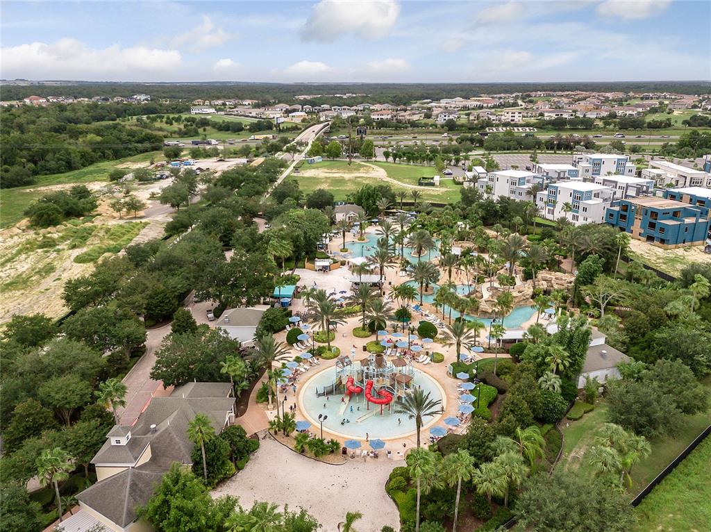 1106 Sunset View Circle, Unit 201 Reunion, FL 34747 - Photo 26 of 31 an aerial view of residential houses with outdoor space