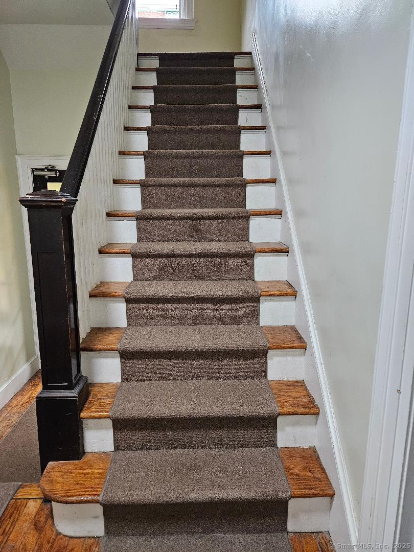 211 Fountain Street New Haven, CT 06515 - Photo 15 of 19 a view of entryway and hall with wooden floor