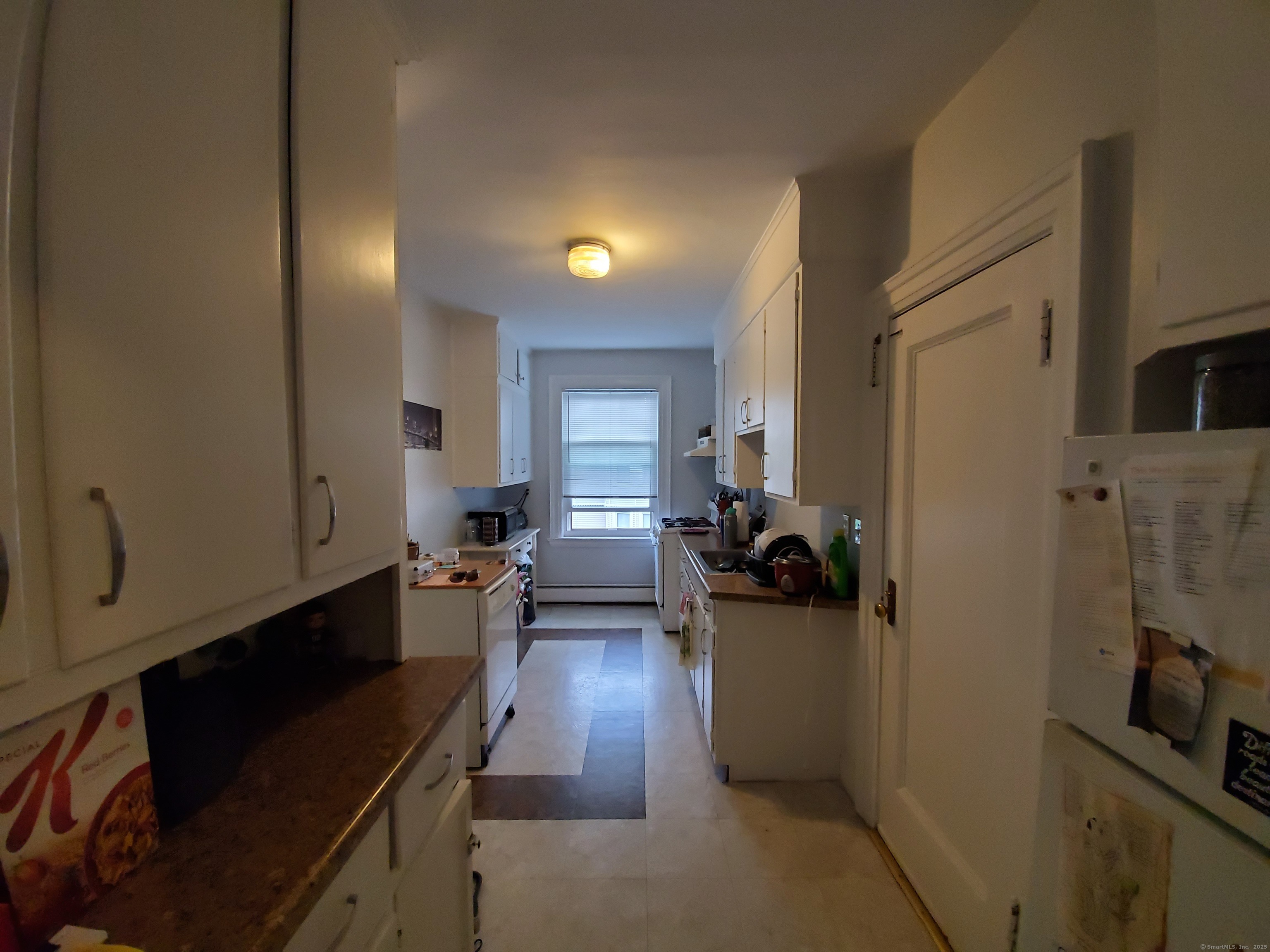 211 Fountain Street New Haven, CT 06515 - Photo 4 of 19 a view of a living room with furniture and wooden floor