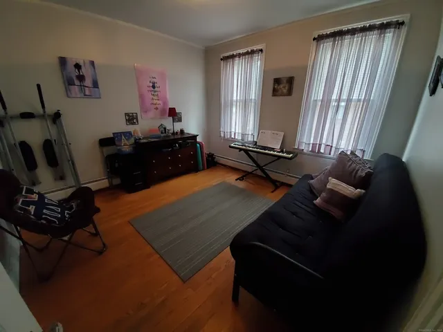 a room with furniture and a window