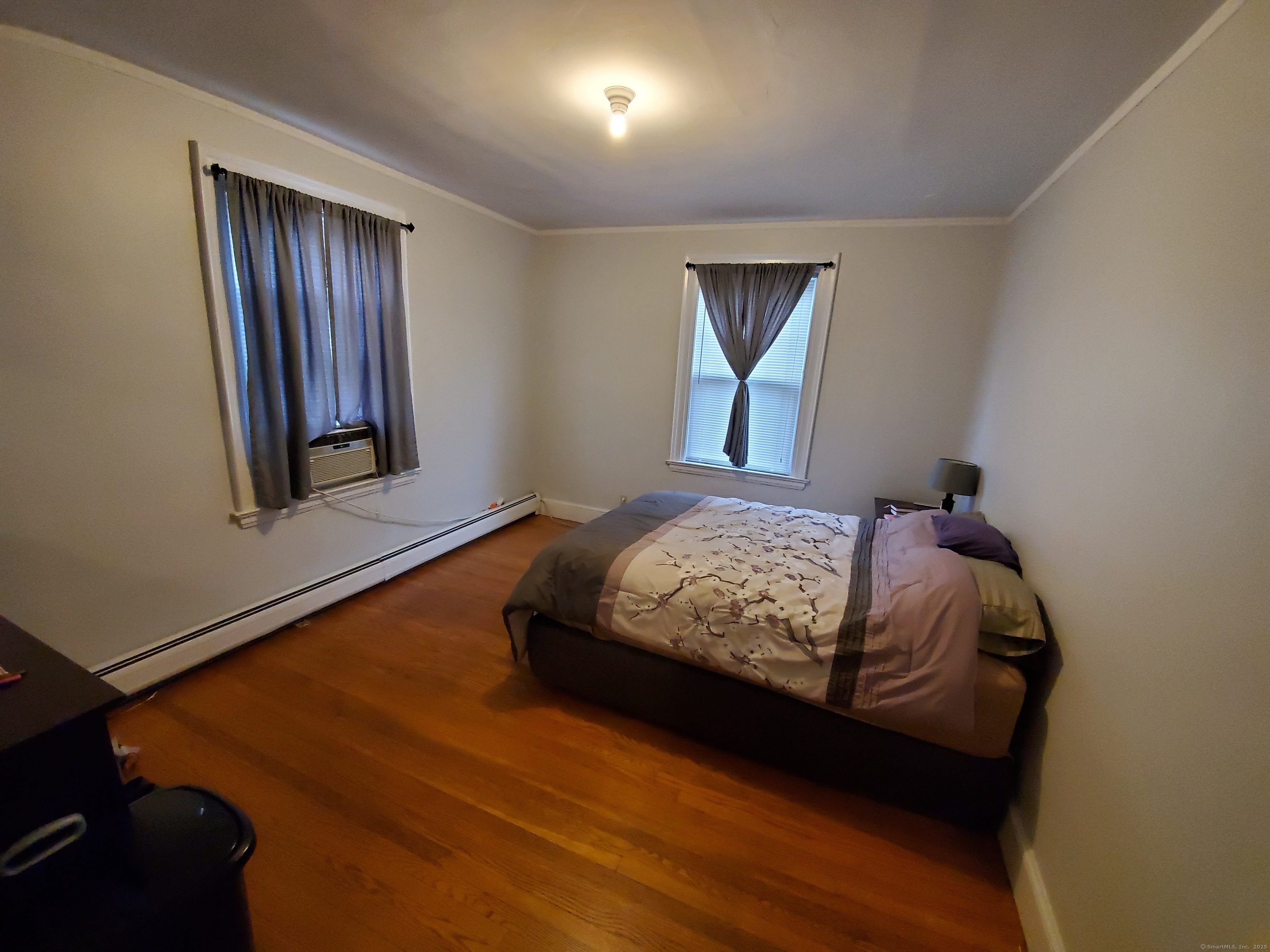 211 Fountain Street New Haven, CT 06515 - Photo 6 of 19 a bedroom with a bed and window