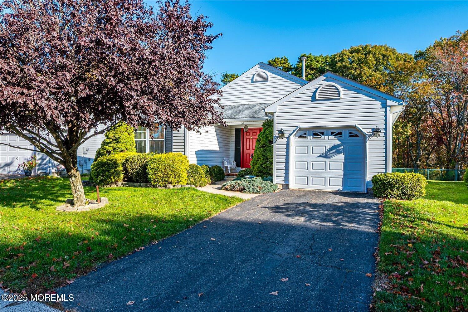 36 Sleepy Hollow Drive Brick, NJ 08724 - Photo 2 of 47 a front view of a house with garden