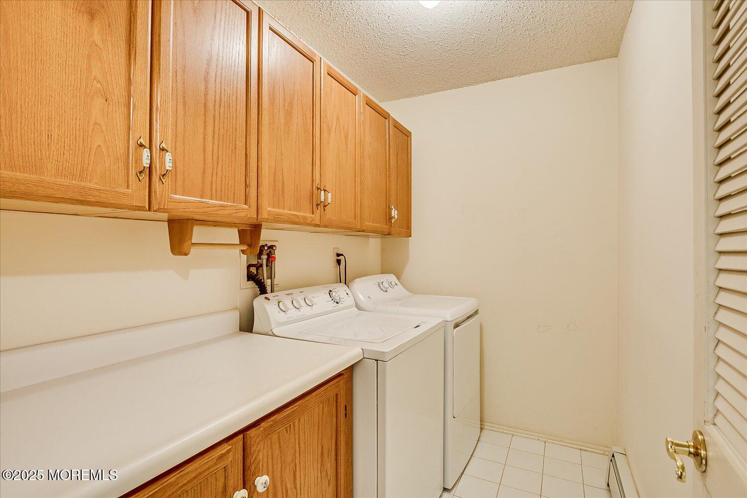 36 Sleepy Hollow Drive Brick, NJ 08724 - Photo 30 of 47 a utility room with dryer and washer