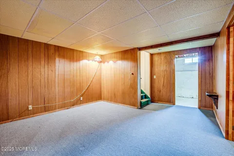 a view of a livingroom with a wooden door
