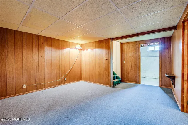 a view of a livingroom with a wooden door