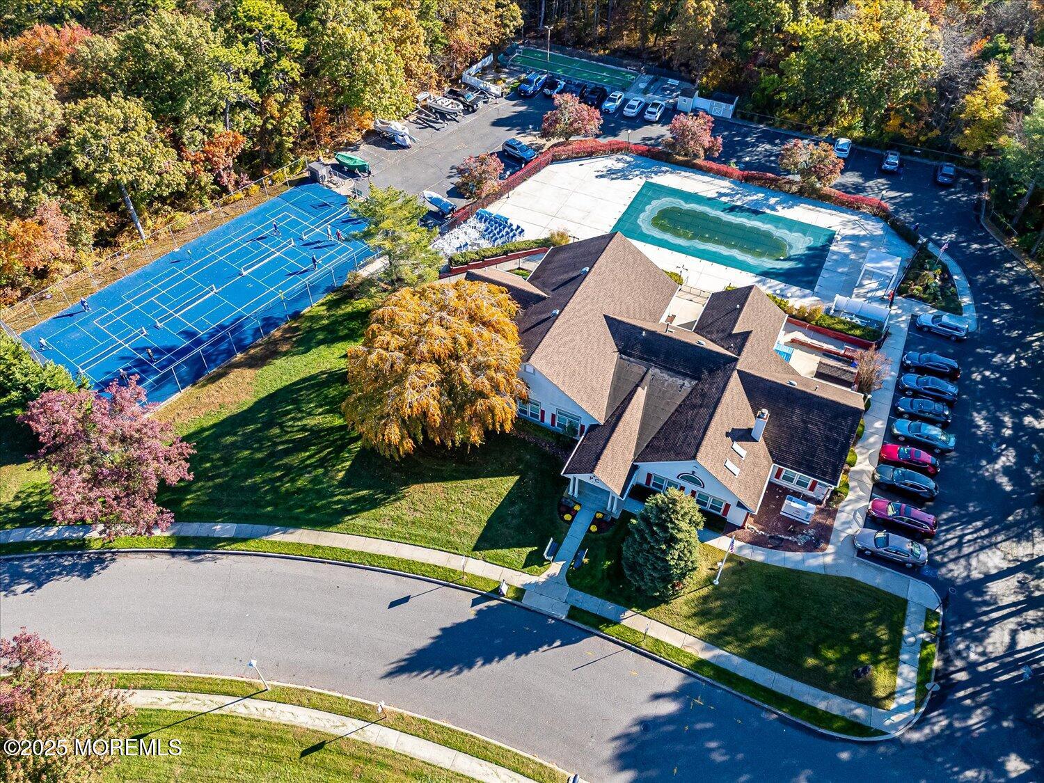 36 Sleepy Hollow Drive Brick, NJ 08724 - Photo 42 of 47 an aerial view of a house with a yard and outdoor seating
