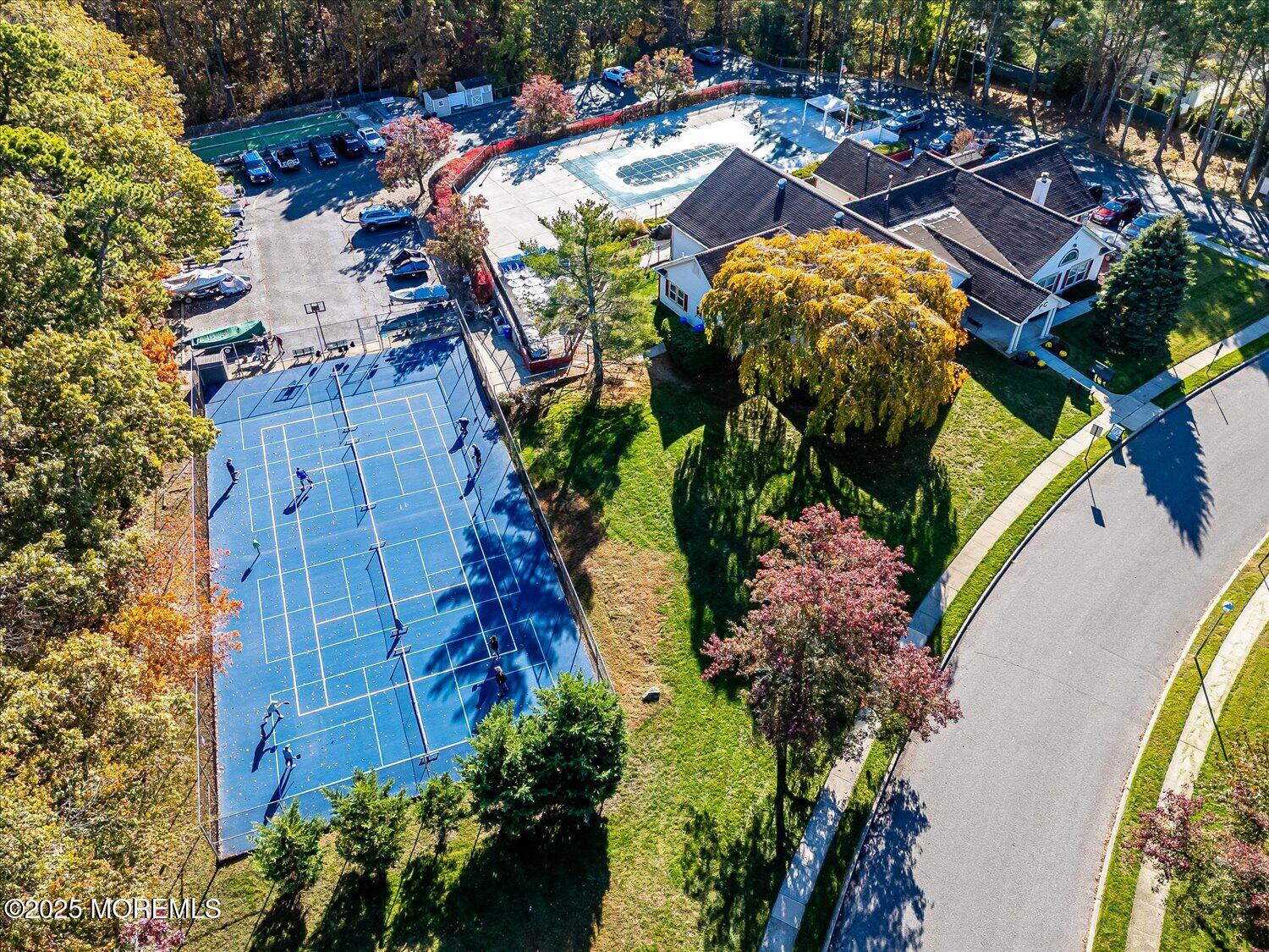 36 Sleepy Hollow Drive Brick, NJ 08724 - Photo 46 of 47 an aerial view of a house with a swimming pool and outdoor seating