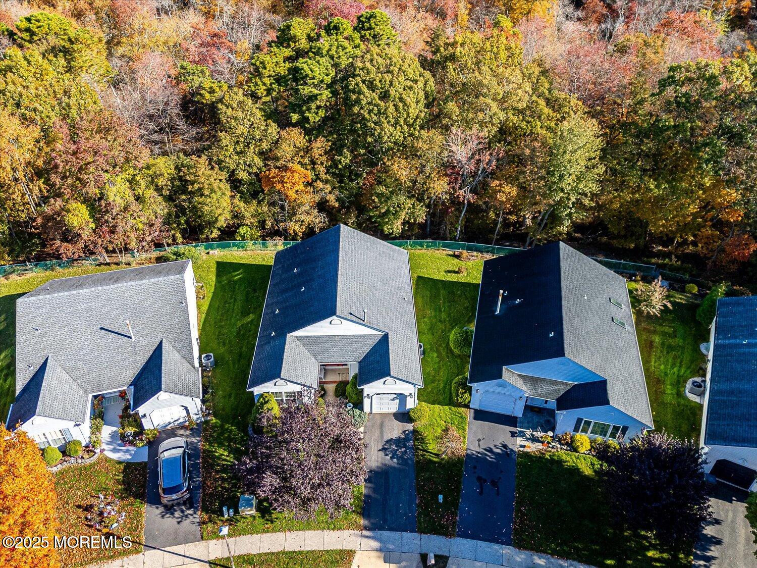 36 Sleepy Hollow Drive Brick, NJ 08724 - Photo 5 of 47 a view of pool with lawn chairs under an umbrella