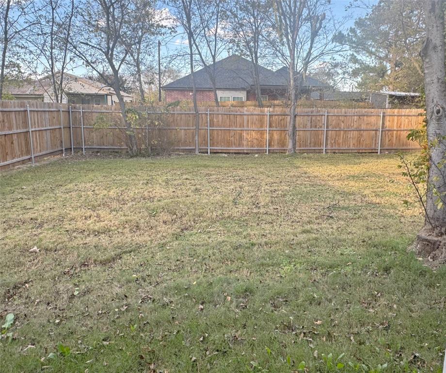 3912 Oneal Street Greenville, TX 75401 - Photo 17 of 20 a view of a backyard of the house