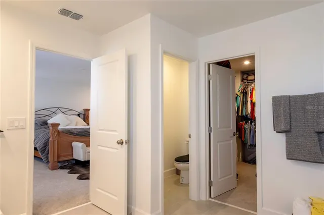 a view of a livingroom with furniture and closet