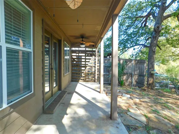 a view of a porch with a backyard