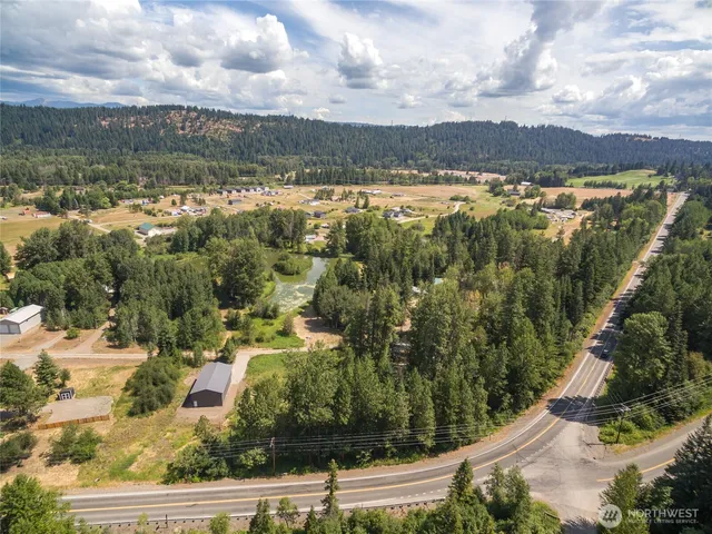 an aerial view of residential building and lake view