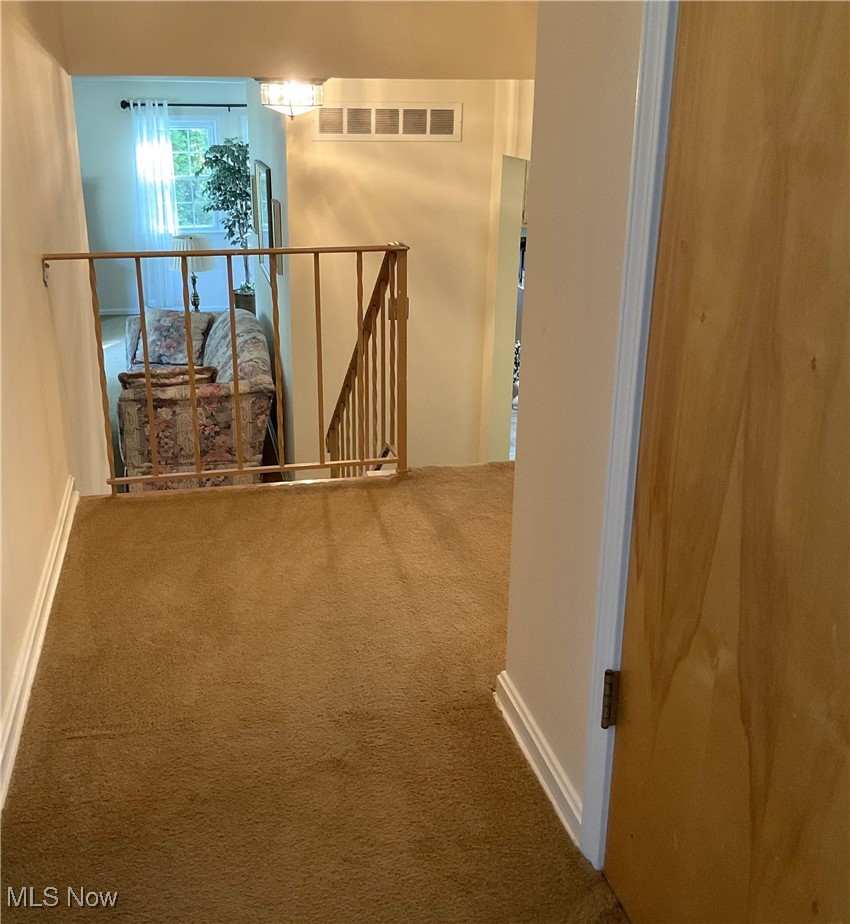 2478 Barrington Road Akron, OH 44333 - Photo 11 of 23 The upstairs hall boasts a walk-in closet and separate linen closet