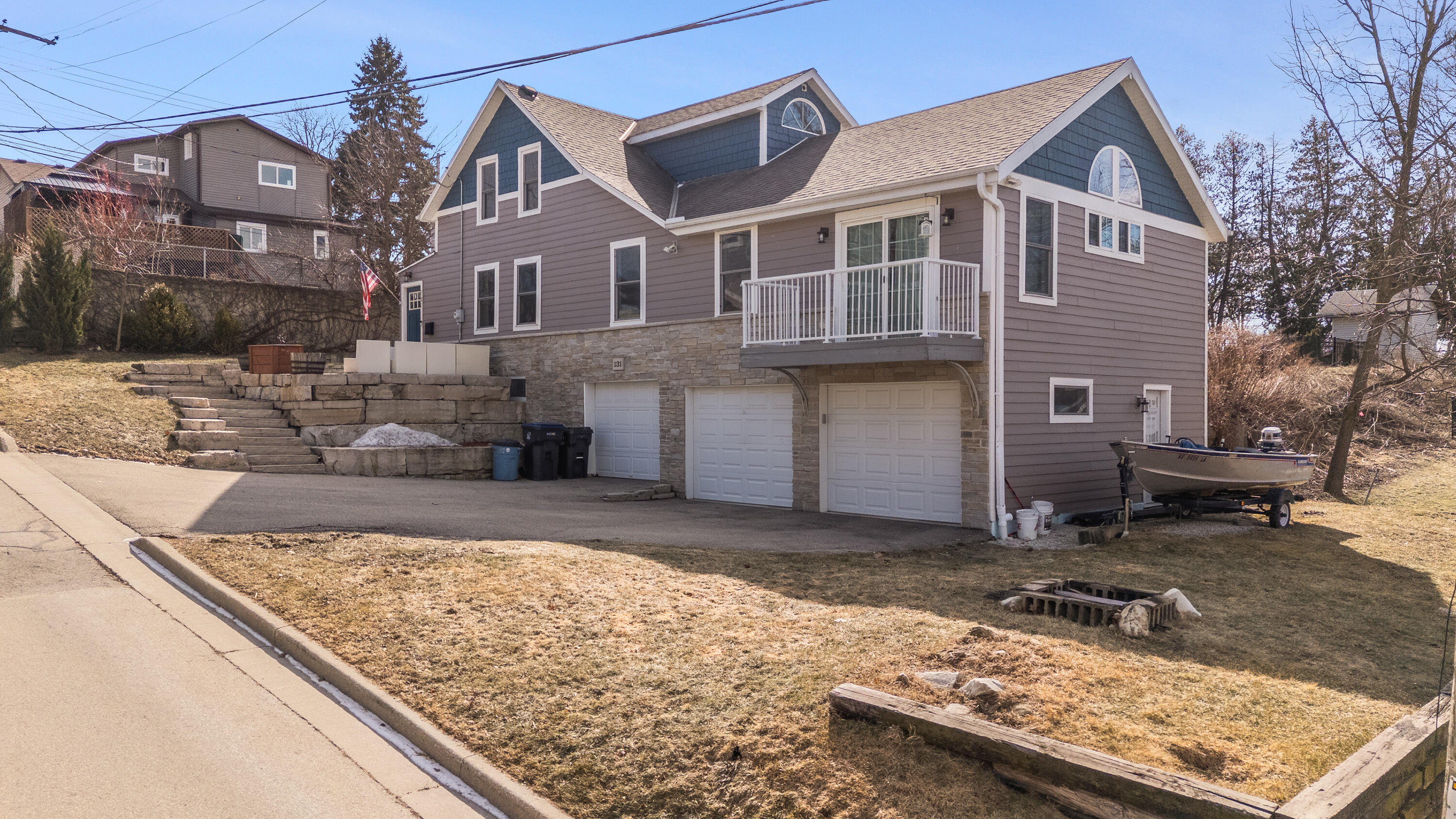 131 Maple Avenue Pewaukee, WI 53072 - Photo 3 of 36 3 Car Garage