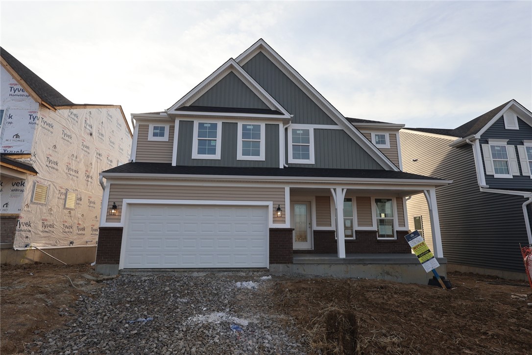 240 Tilly Court, Unit 5 Springboro, OH 45066 - Photo 9 of 26 This new construction home features a harmonious blend of siding, inviting a fresh start.