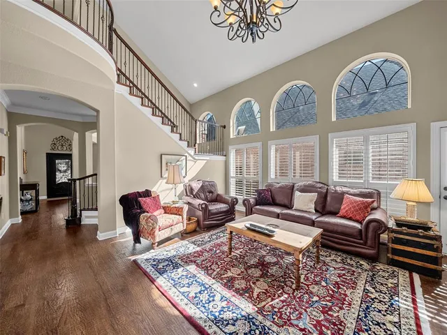 a living room with furniture or couch and a table